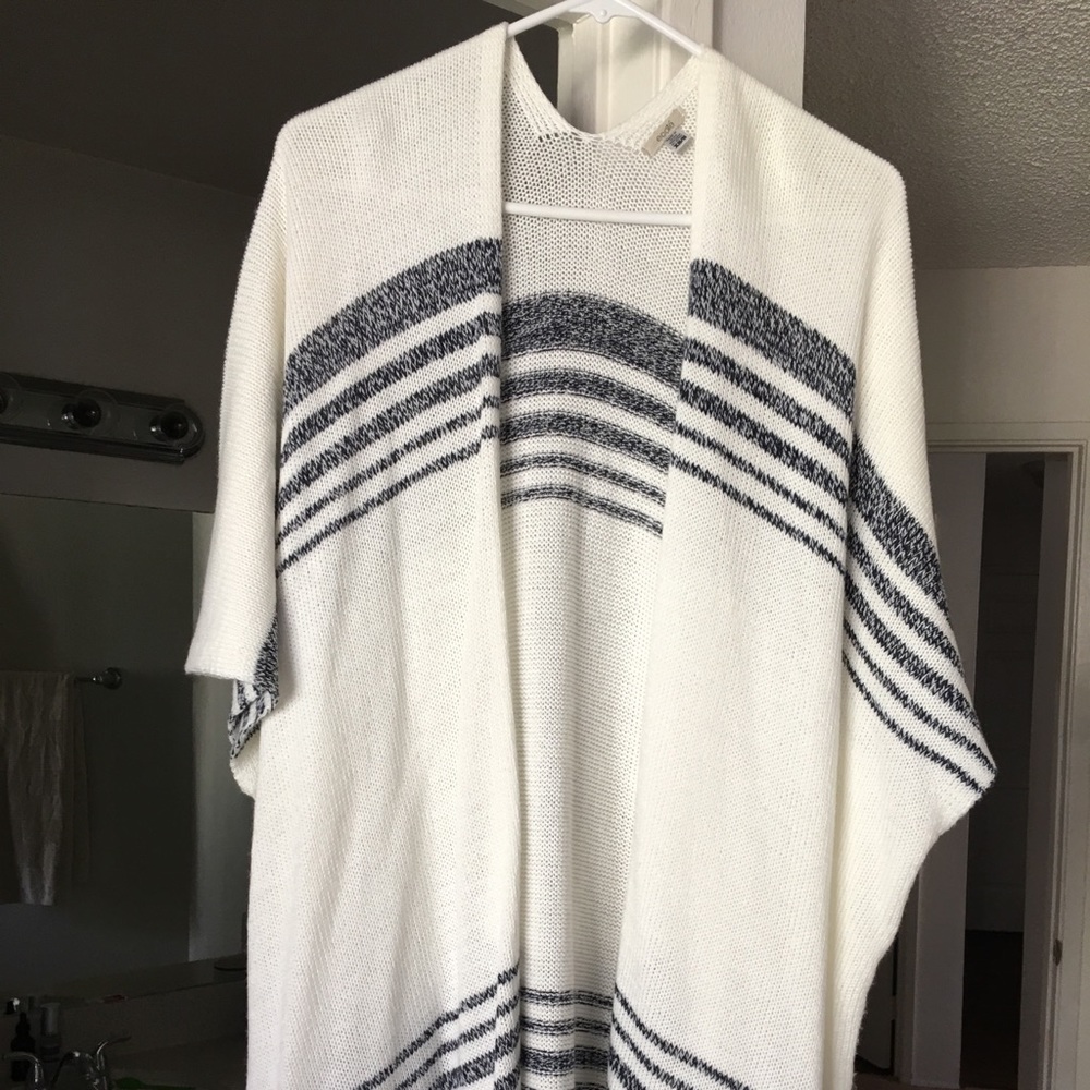 Poncho type sweater.